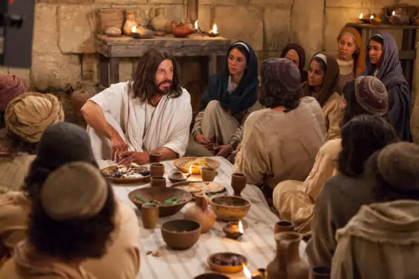 A Picture of the disciples of the lord with Jesus and some of the women who followed him